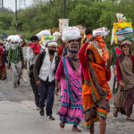 migrant-workers-walking-home-on-foot