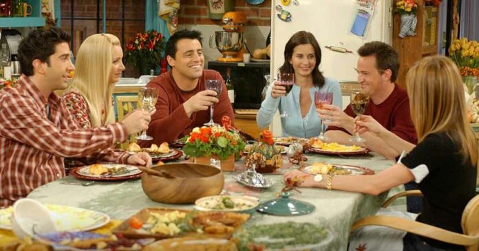 friends cast members having thanksgiving dinner together