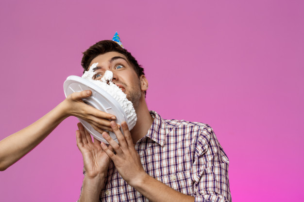 Applying Cake On Face