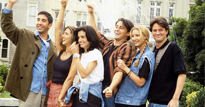 chandler bing looking away in group photo of friends