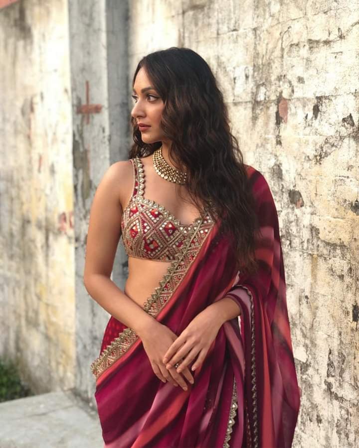 wearing saree like a diva to click photos