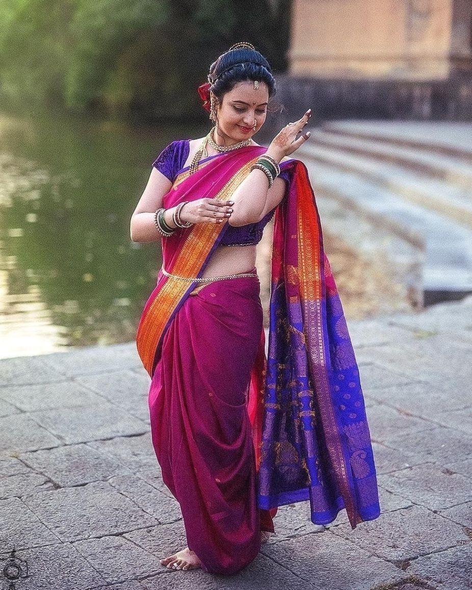 clicking pictures in a nauvari saree