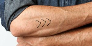 simple tattoo on arm for men