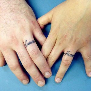 married couple tattoos on finger