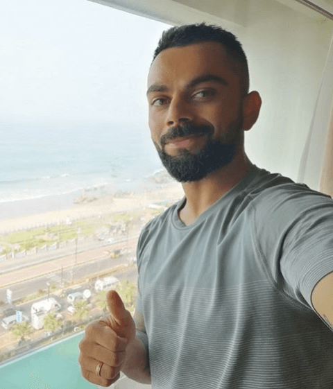 virat kohli in grey tshirt with amazing hairstyle for men