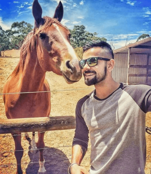 virat-kohli-quiff-hairstyles with a horse