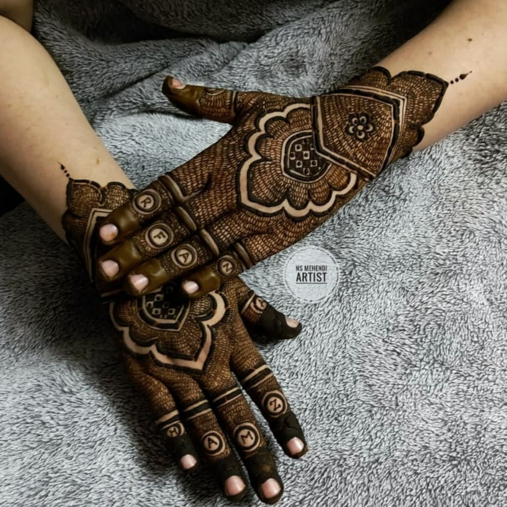 detailed full back hand traditional mehendi design