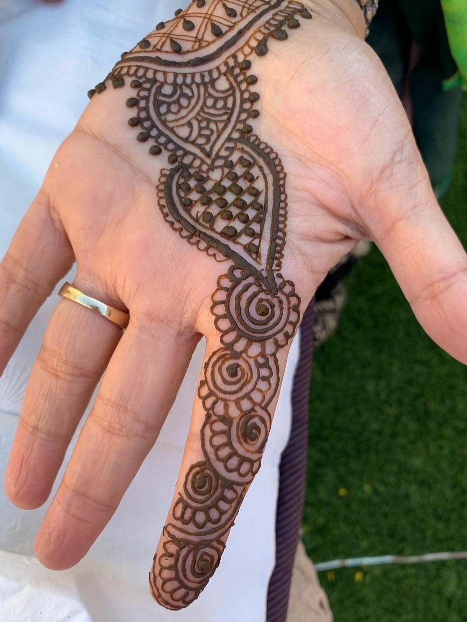 Simple and clean mehndi design for groom