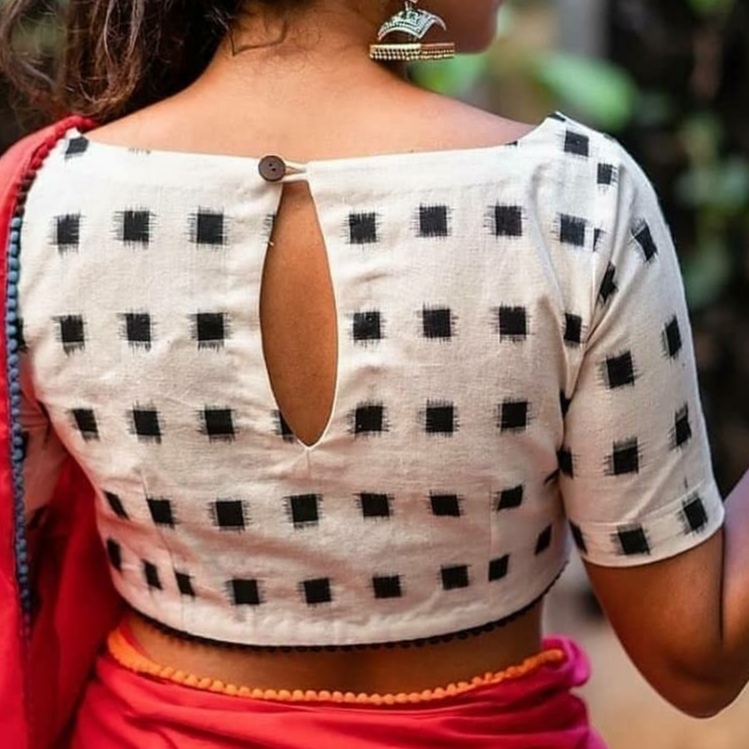 Back buttoned keyhole blouse design