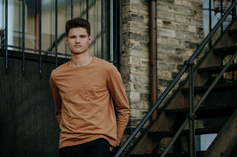 Climbing down the stairs is a classic Instagram pose for men