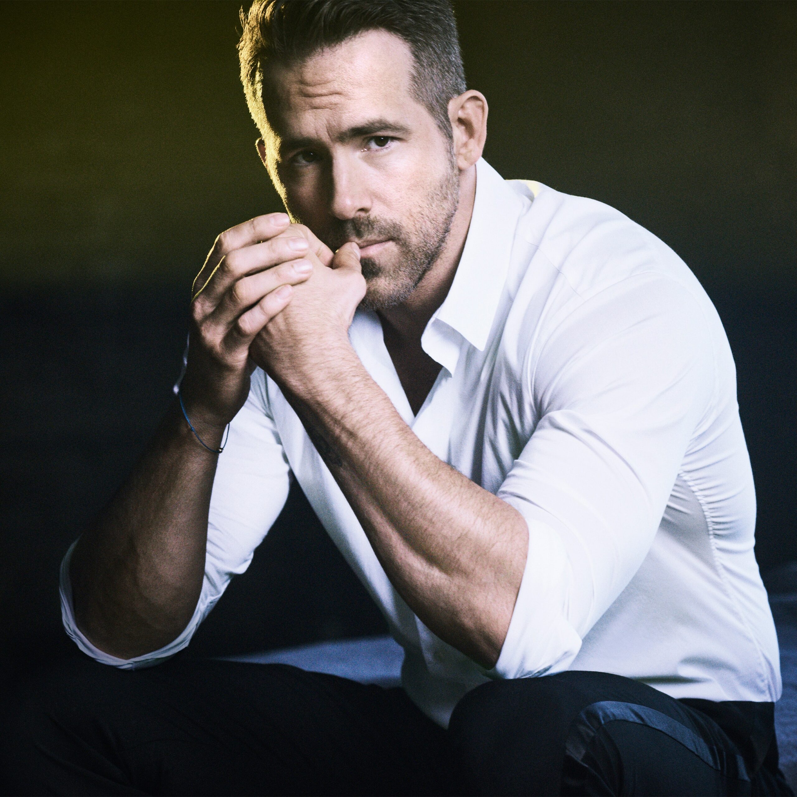 Ryan Reynolds psoing for Vogue