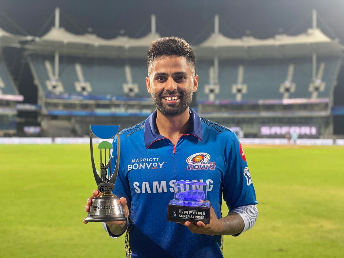 Surya Kumar Yadav Mumbai Indians holding a trophy