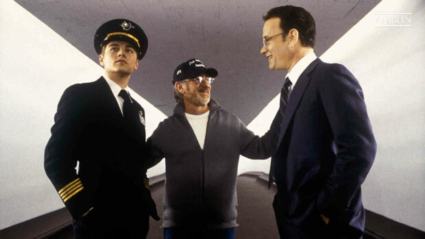 A headshot of Leaonardo DiCaprio, Tom Hanks and Steven Spielberg with a serious expression from Catch Me If You CanMovie