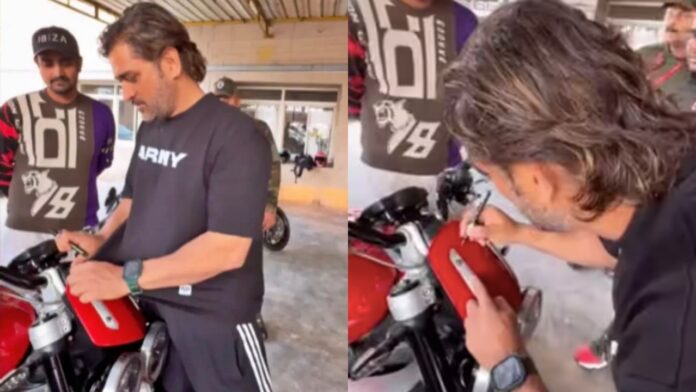 Dhoni cleans the dust from a Fan's Bike before Signing it, Video Goes Viral